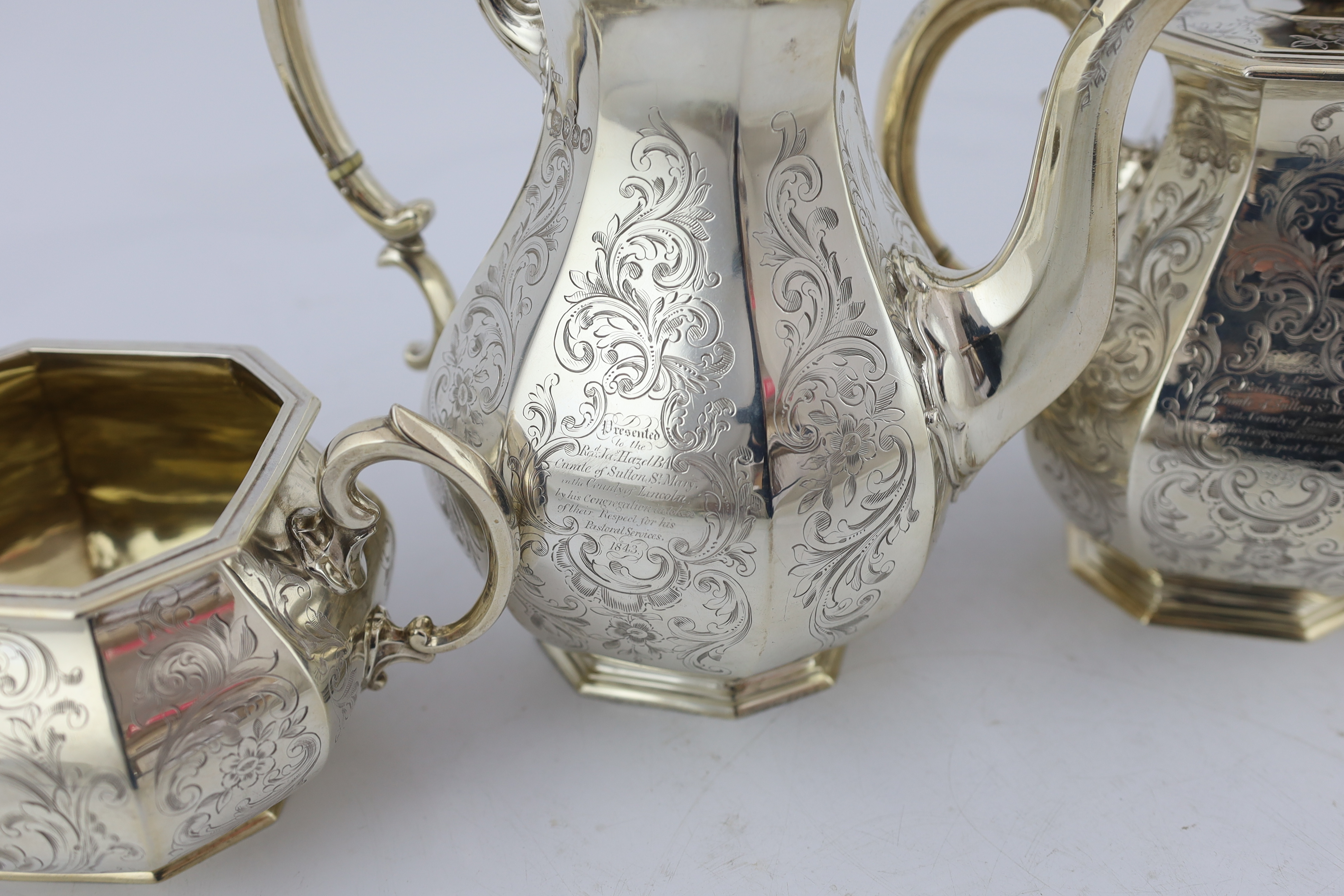 A Victorian engraved silver octagonal four piece silver tea and coffee service, by William Robert Smily